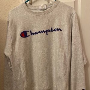 light grey Champion sweater in a mens size small.